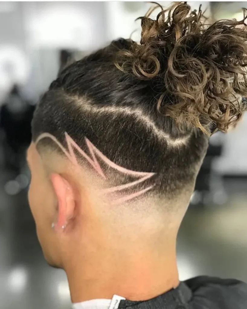 Bold Shaved Design with Curly Undercut