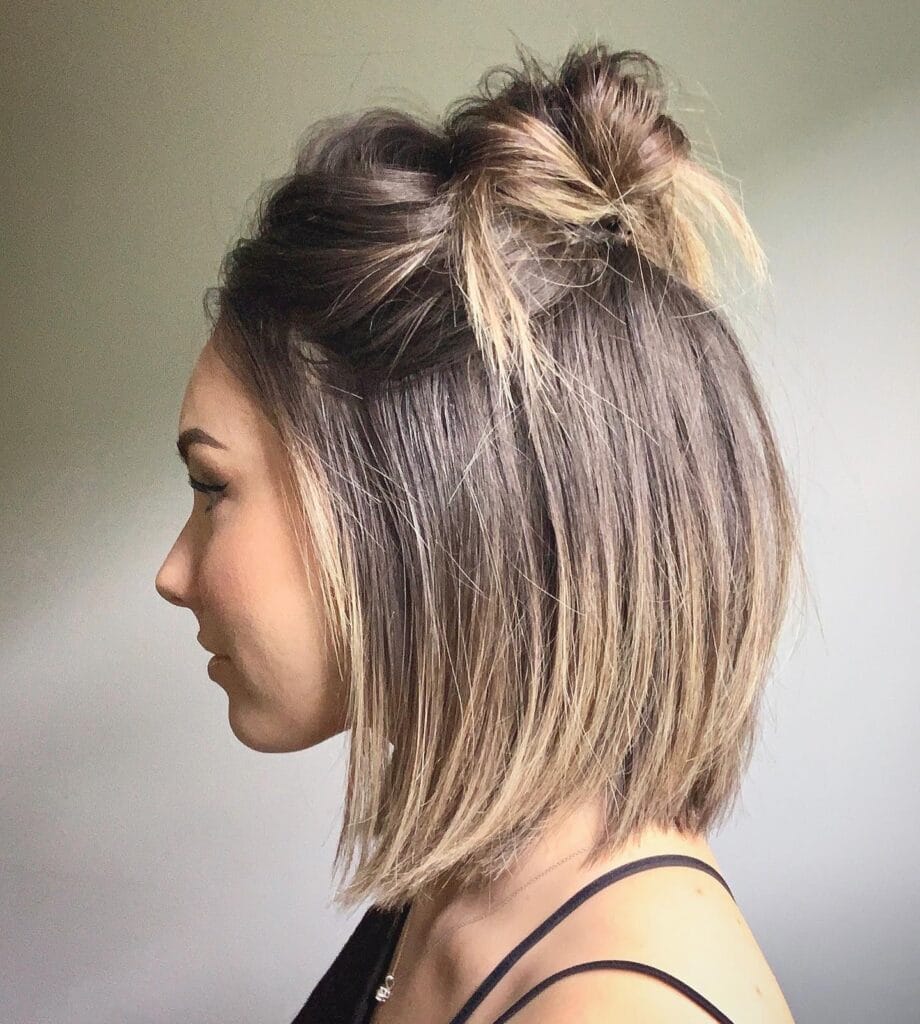 6. Half-Up Bun on Textured Bob Cut
