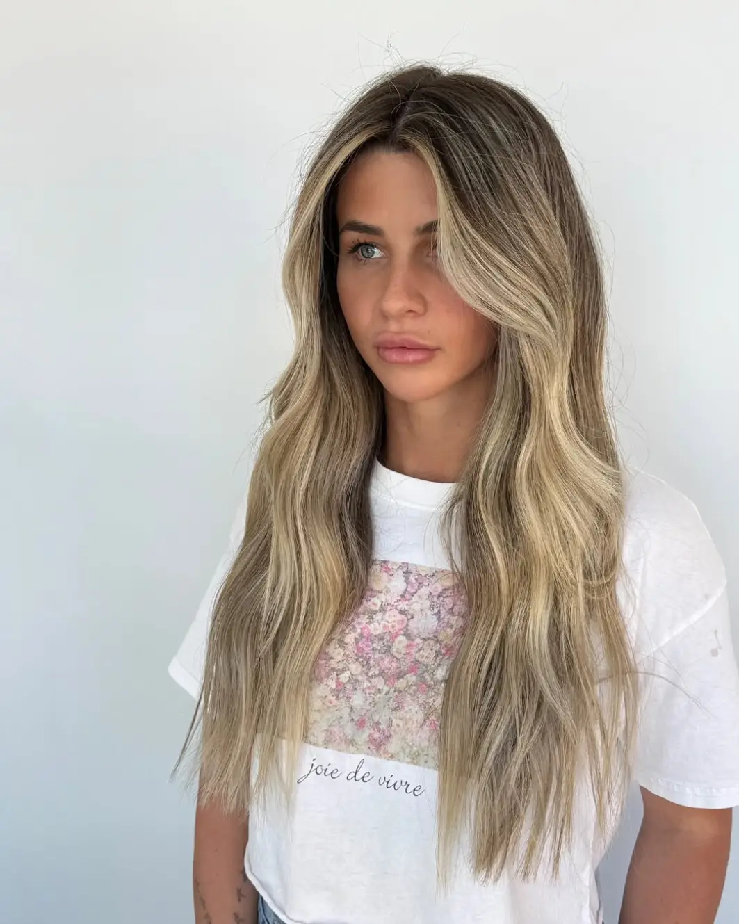 Sandy Blonde Waves with Soft Center Part