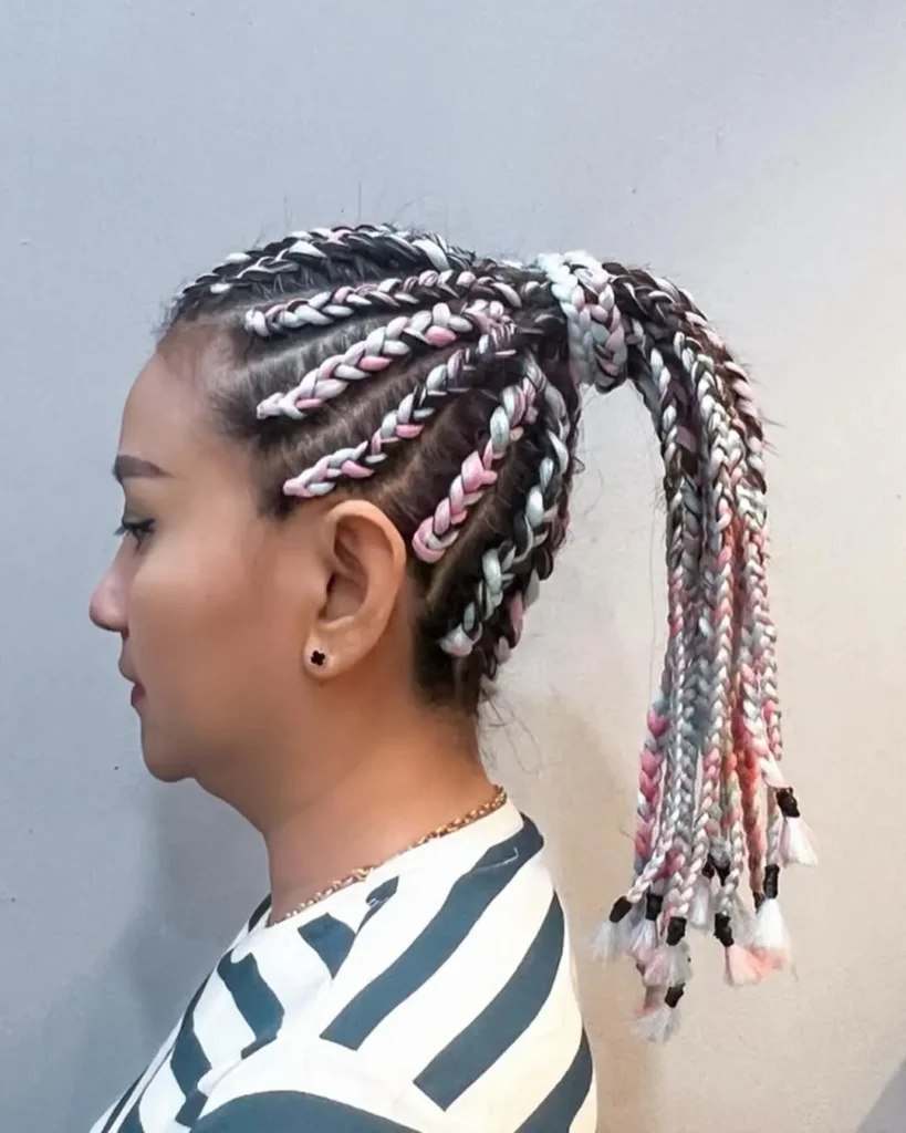 #13. Cotton Candy Cornrow Ponytail with Ombre Ends
