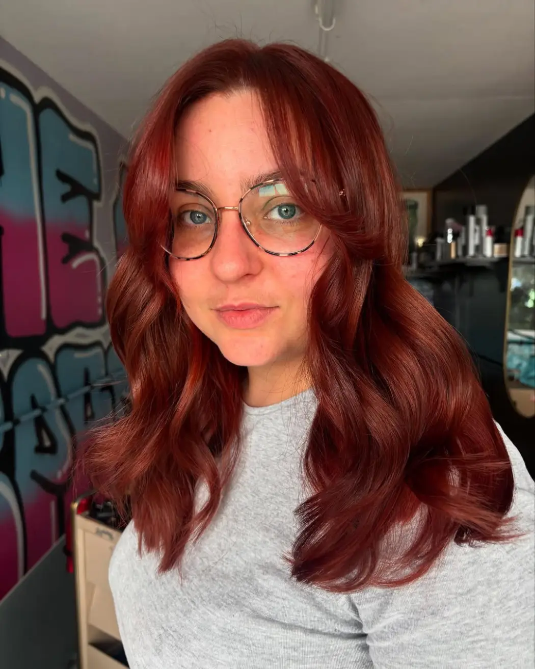 #15. Auburn Waves with Soft Curtain Bangs