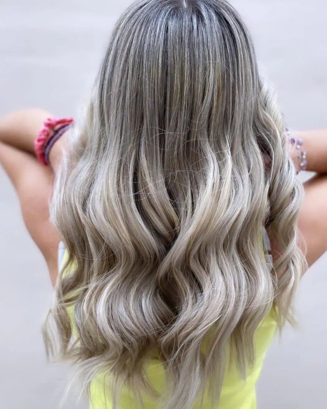 24 Striking Brown Hair with Silver Highlights Ideas: Sophisticated Looks to Refresh Your Style 16 #15. Rooted Ash Brown with Silver Blonde Balayage Waves