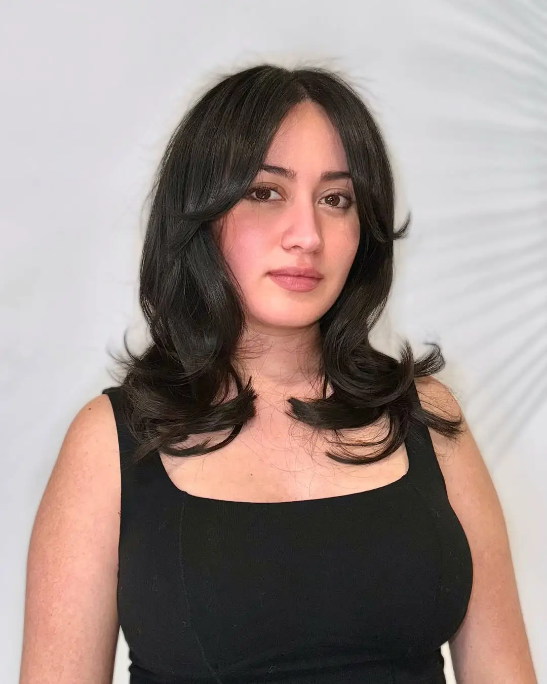 #18. Modern Layered Shag with Side-Swept Bangs