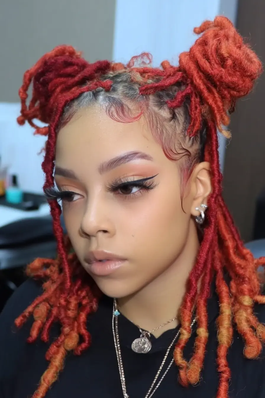 19 Creative Locs Hairstyles: Statement-Making Styles to Try Now 20 #19. Red and Orange Locs with Space Buns