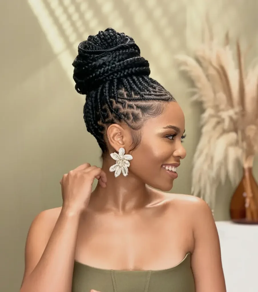 #2. Braided Crown High Bun with Geometric Feed-Ins