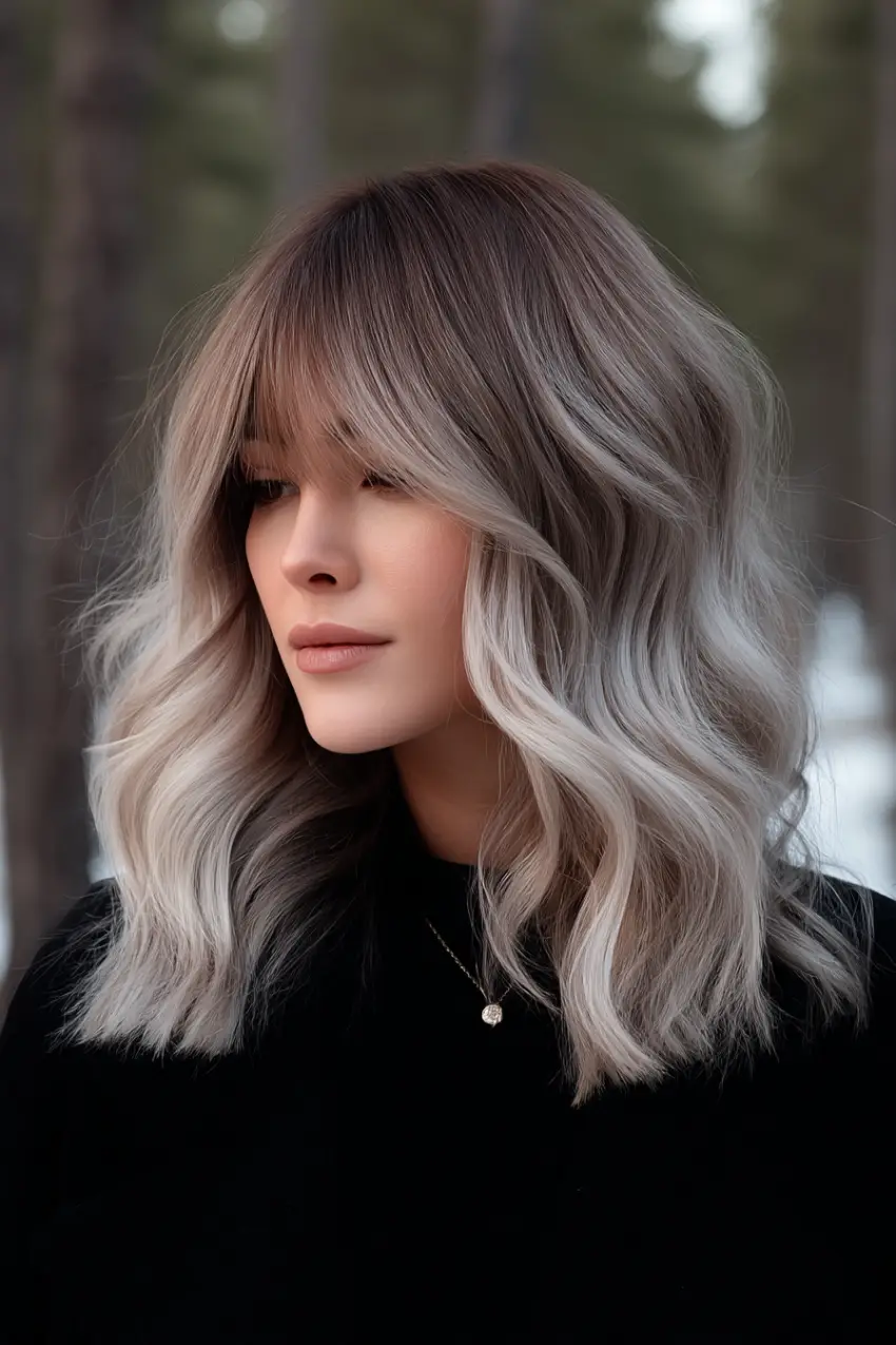 24 Striking Brown Hair with Silver Highlights Ideas: Sophisticated Looks to Refresh Your Style 25 #24. Toffee Brown Lob with Soft Silver Frost and Curtain Bangs