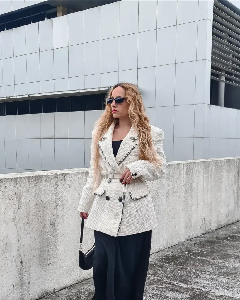 #4. Textured Cream Blazer with Black Maxi Dress and Sleek Handbag