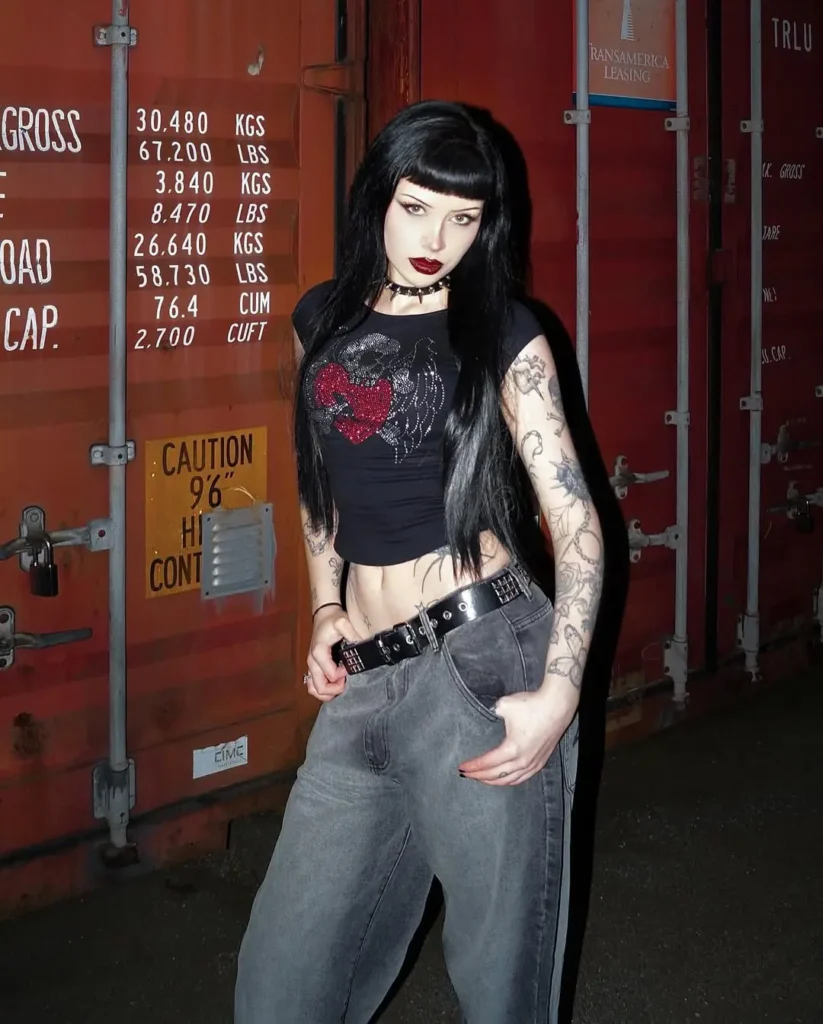 #6. Graphic Dragon Crop Tee with Studded Belt and Washed Baggy Jeans