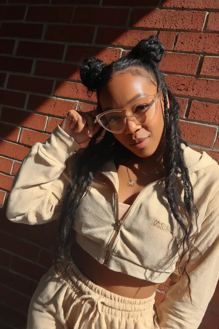 19 Creative Locs Hairstyles: Statement-Making Styles to Try Now 8 #7. Locs with Double Buns and Loose Lengths