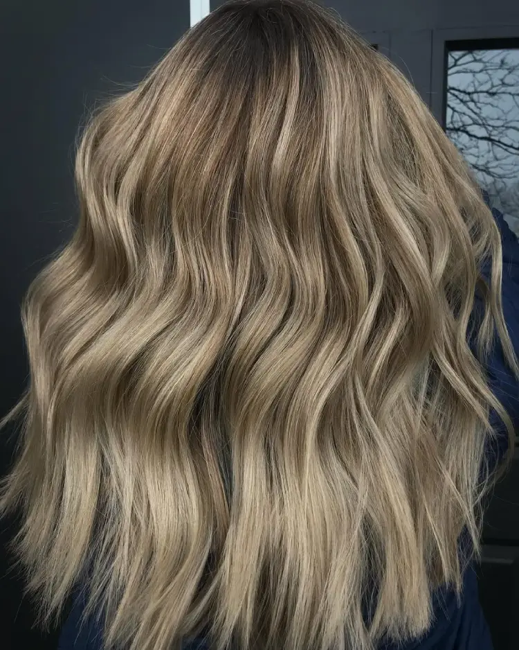 #7. Root-Melted Sandy Blonde with Lowlights