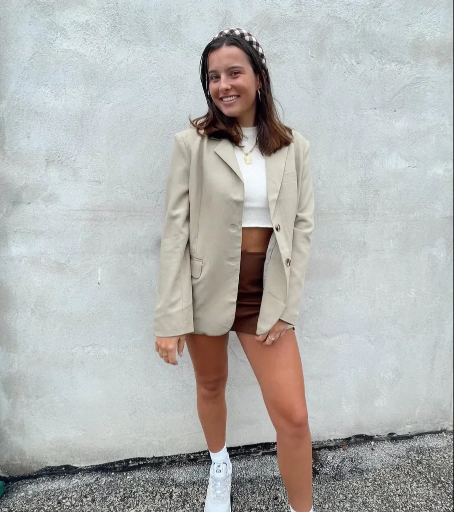#8. Beige Oversized Blazer with Crop Top and Faux Leather Mini Skirt