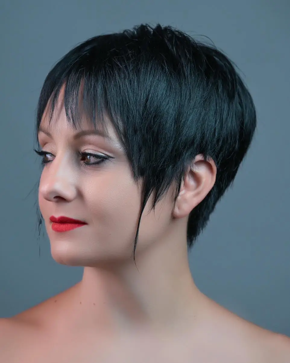 21 Chic Short Layered Hairstyles: Modern Cuts for a Fresh, Youthful Vibe 9 #8. Precision-Cut Jet Black Pixie with Micro Fringe