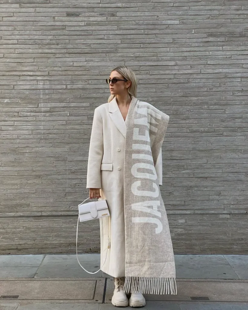 #9. Oversized Cream Coat with Statement Logo Scarf and Structured Mini Bag