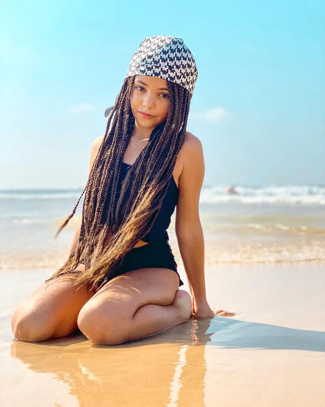 20 Bandana Hairstyles: Playful Looks to Refresh Your Everyday Style 16 Box Braids with Geometric Bandana for Beach Days