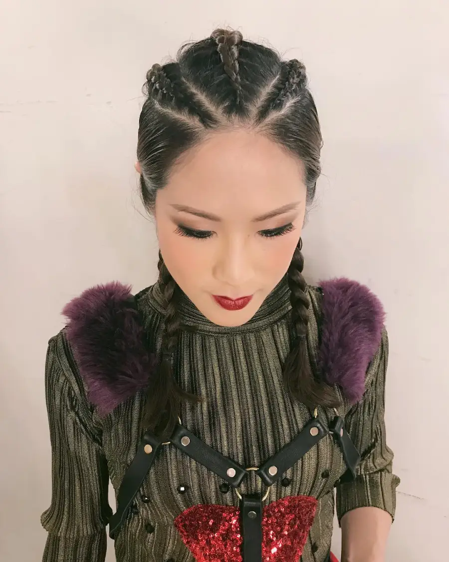 26 Bold Dance Hairstyles: Show-Stopping Styles for Stage and Studio 13 Tight Cornrow Pigtails with Edgy Attitude