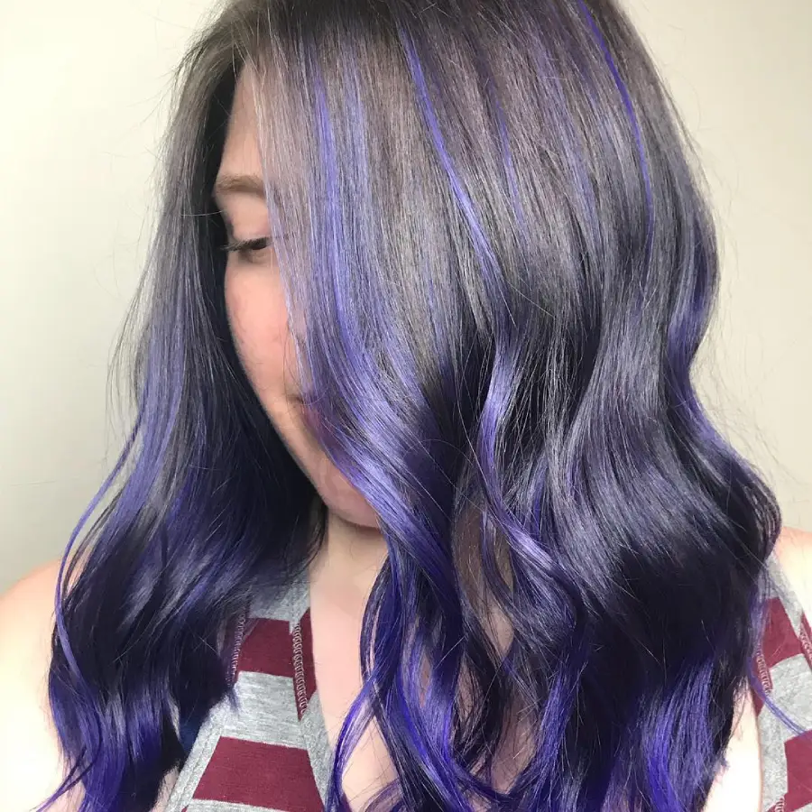 21 Stylish Hairstyles for Job Interviews: Sharp and Modern Looks to Stand Out 10 Wavy Layers with Bold Purple Ombre