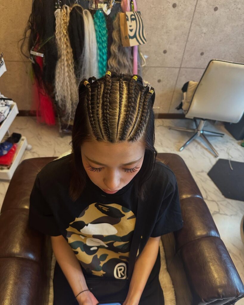7. Short Cornrows with Bead Accents