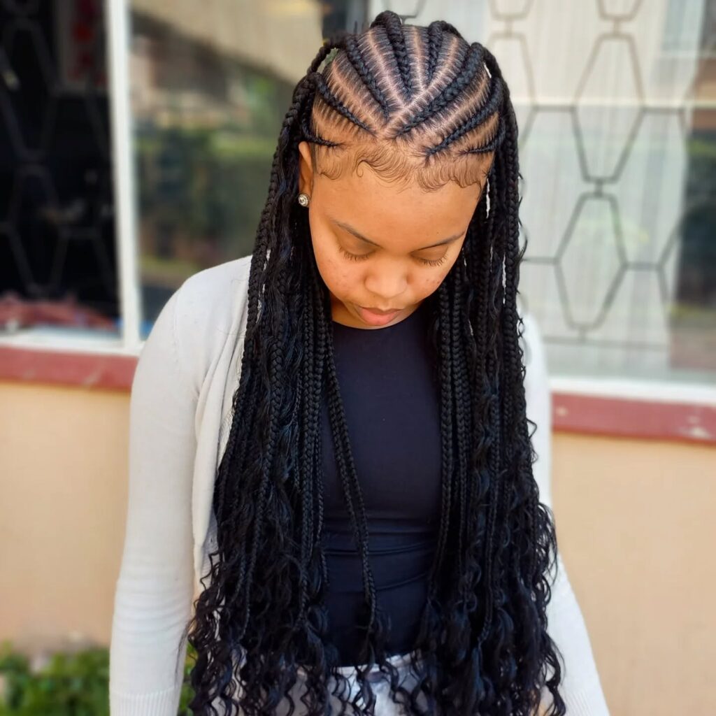 9. Side-Swept Cornrows with Curly Ends