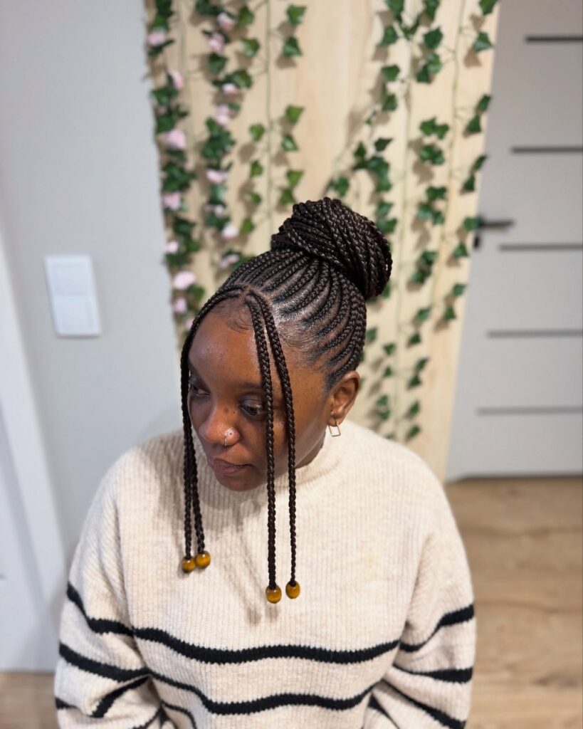 12. High Bun Cornrows with Beaded Face Frames