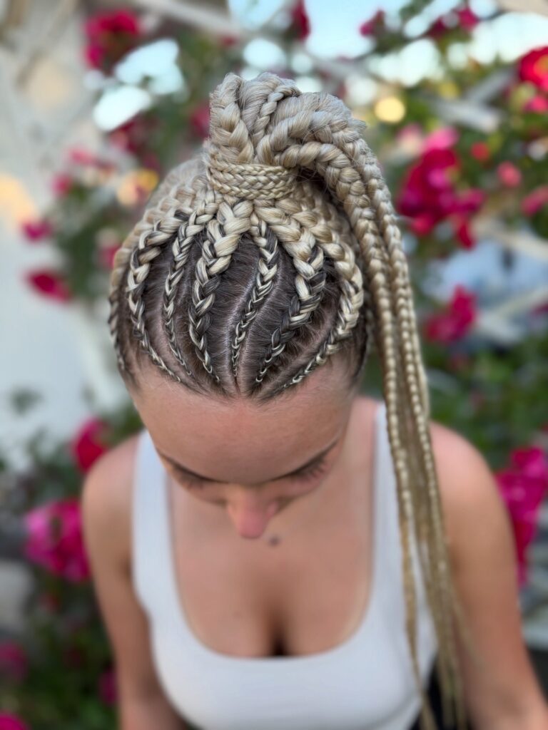 1. High Ponytail Cornrows with Braided Wrap